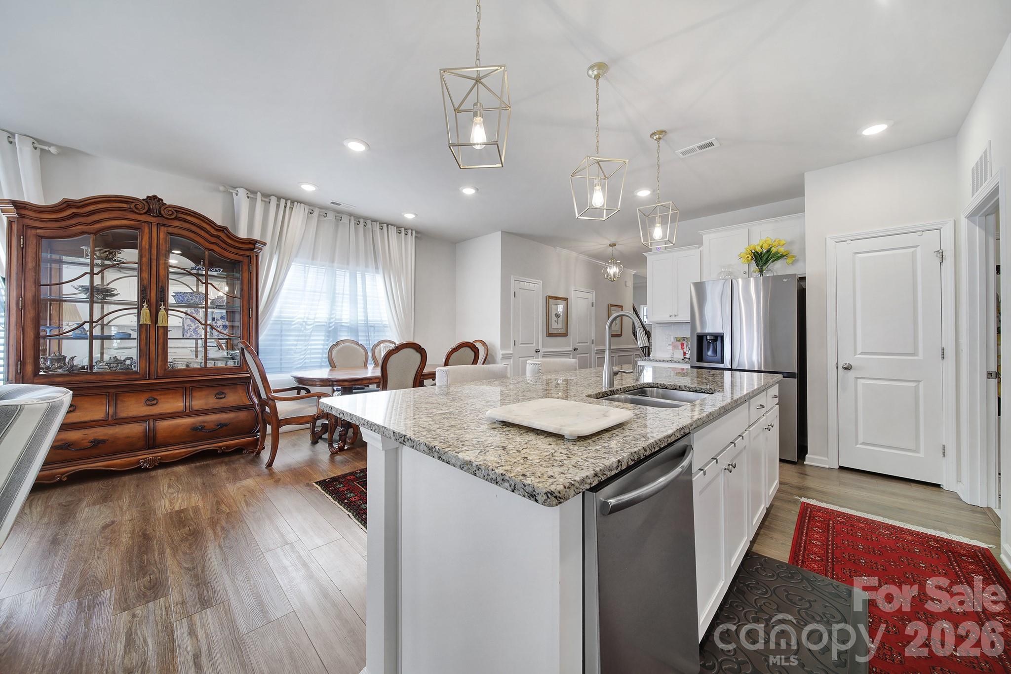 6521 Gopher Road Lancaster, SC 29720 - Photo 11 of 45 a kitchen with granite countertop a sink and a stove top oven