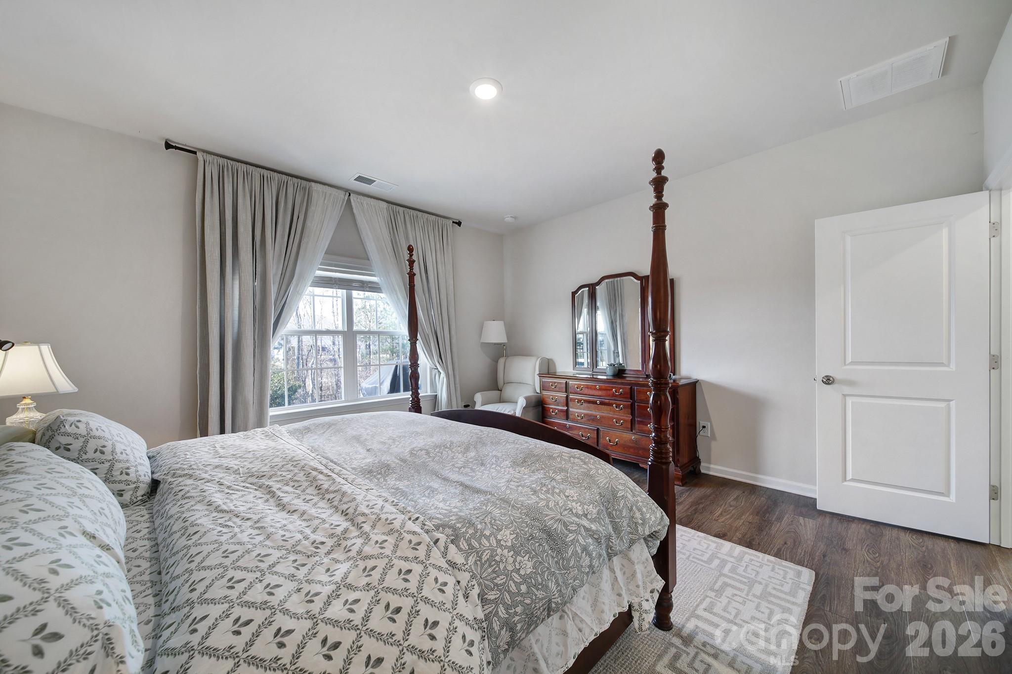 6521 Gopher Road Lancaster, SC 29720 - Photo 21 of 45 a bedroom with a bed dresser and a window