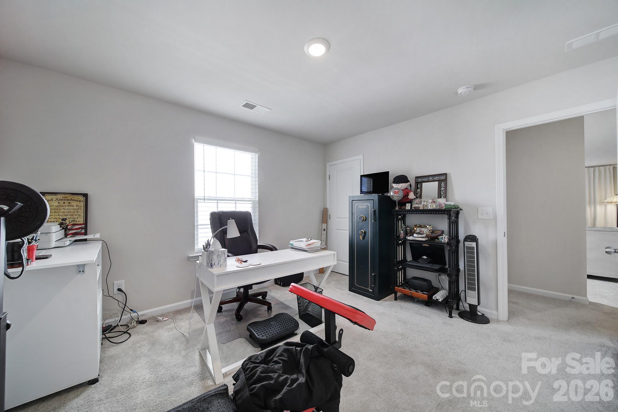 6521 Gopher Road Lancaster, SC 29720 - Photo 24 of 45 a view of a workspace with furniture and a window