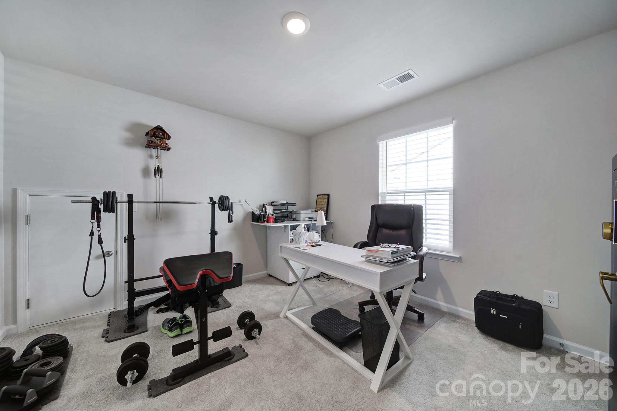 6521 Gopher Road Lancaster, SC 29720 - Photo 25 of 45 a view of a workspace with furniture and a window