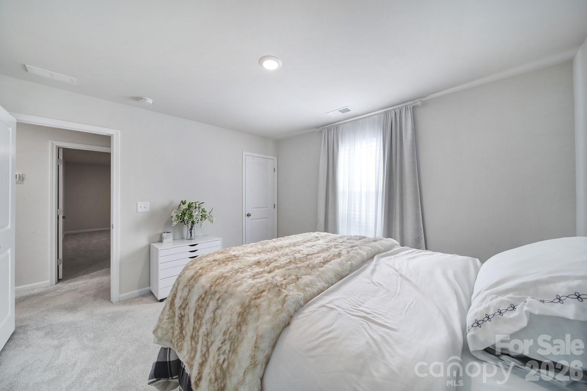 6521 Gopher Road Lancaster, SC 29720 - Photo 27 of 45 a bedroom with a bed and hallway