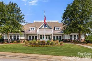 6521 Gopher Road Lancaster, SC 29720 - Photo 40 of 45 a front view of a residential houses with yard and green space