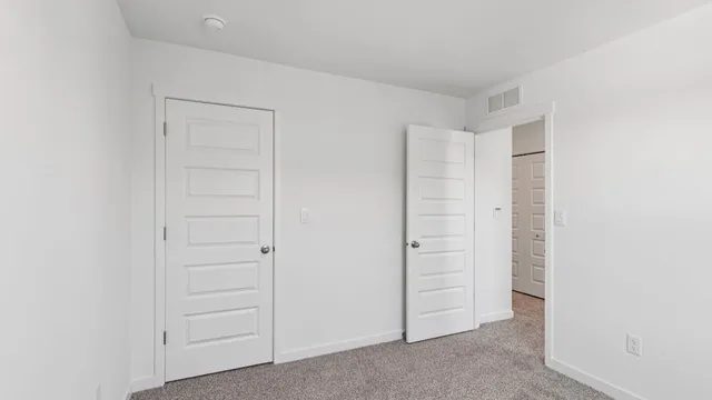 an empty room with closet