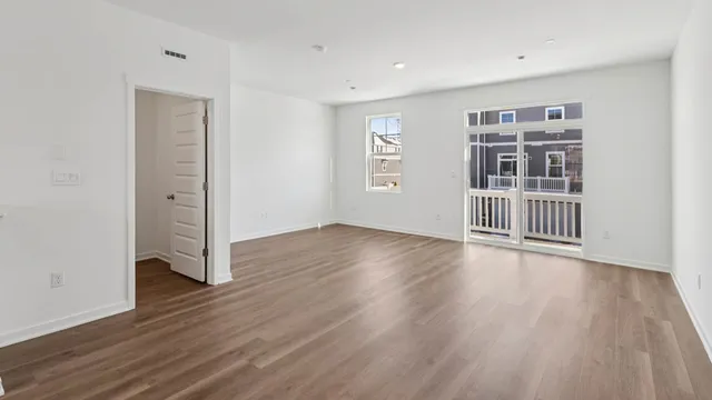 a view of a livingroom with wooden floor