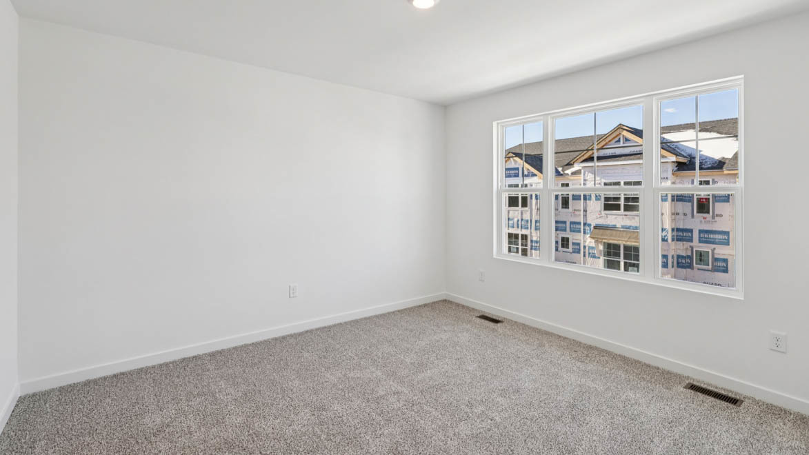 585 Yosemite Way Mundelein, IL 60060 - Photo 10 of 54 a view of an empty room with a window