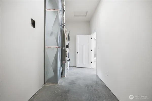 a view of a hallway with a shower