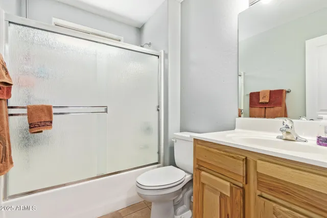 a work room with furniture and windows