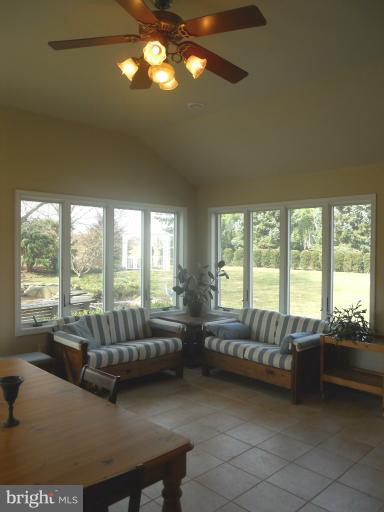 7820 Chapman Road Kingsville, MD 21087 - Photo 15 of 30 View of Sunroom with Cathedral Ceiling