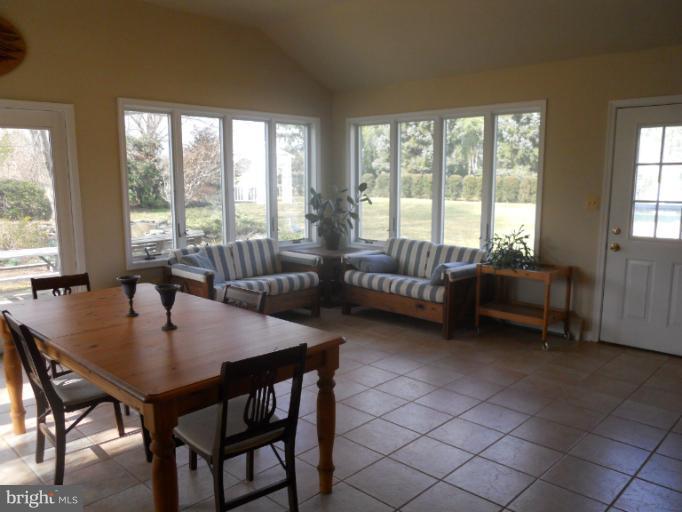 7820 Chapman Road Kingsville, MD 21087 - Photo 16 of 30 View of Sunroom Overlooking Patio