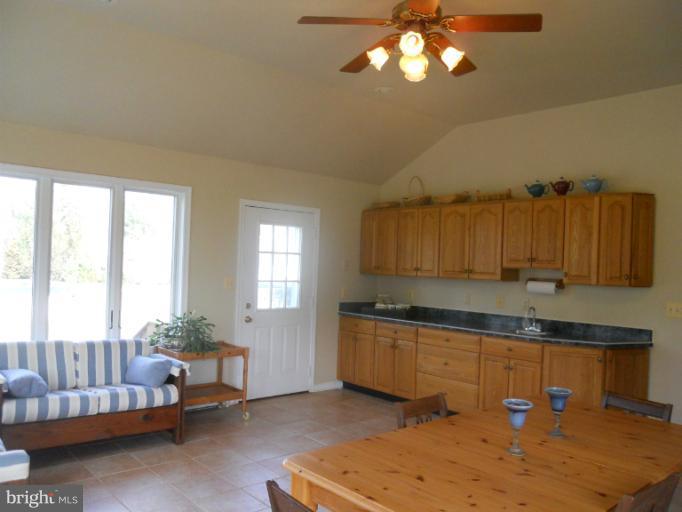 7820 Chapman Road Kingsville, MD 21087 - Photo 25 of 30 View of Sunroom with cabinets and sink