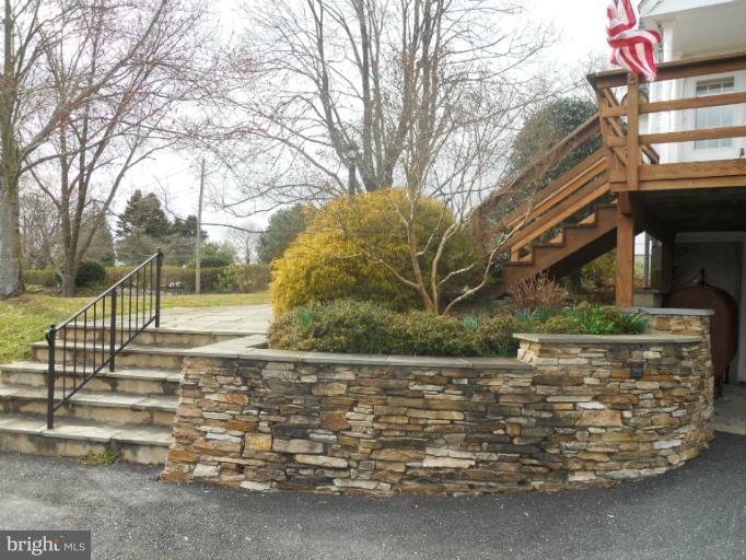 7820 Chapman Road Kingsville, MD 21087 - Photo 26 of 30 View of Landscaped Stone Wall