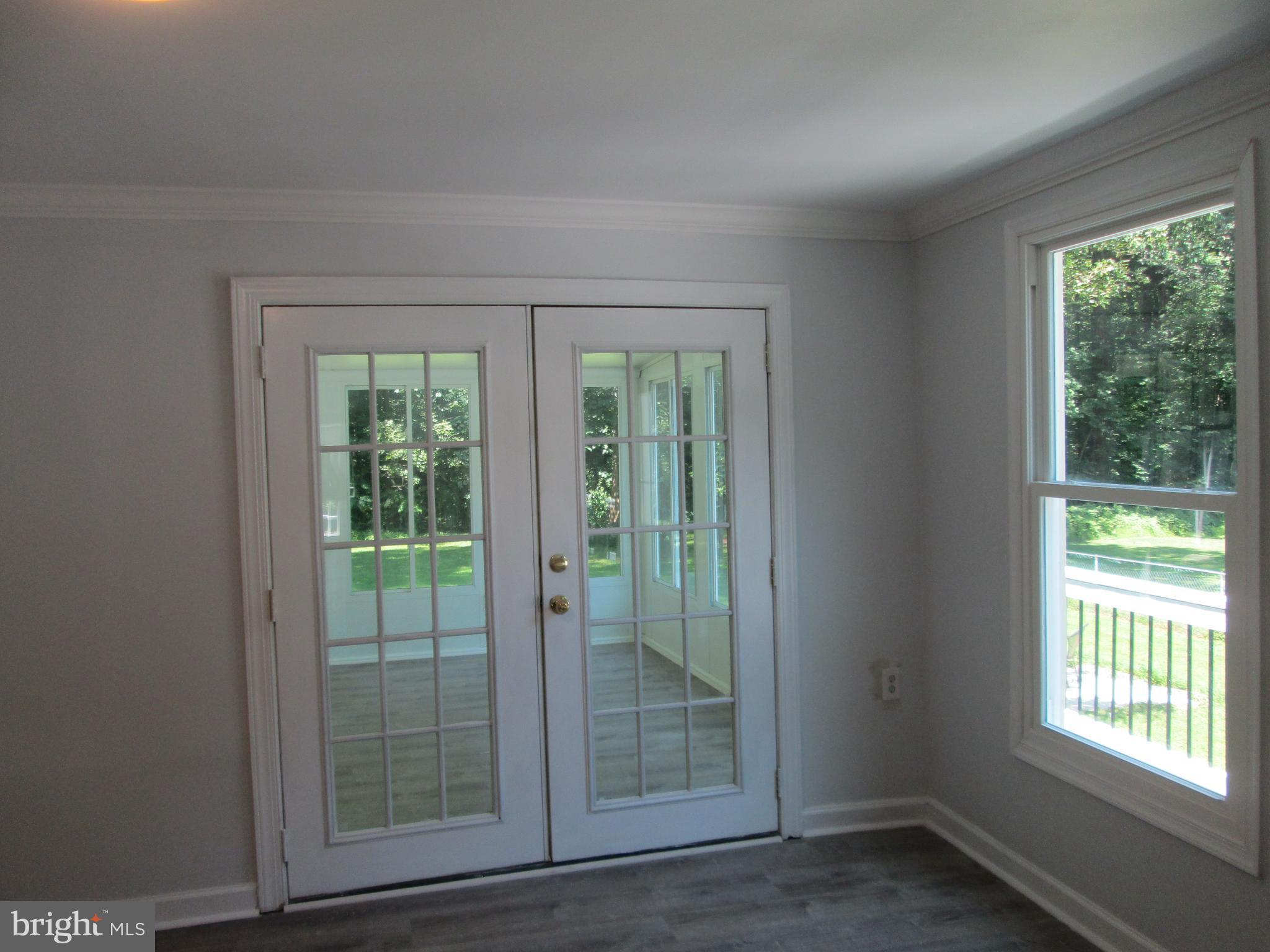 3508 New Design Road Frederick, MD 21703 - Photo 13 of 26 Dining Room looking into Sun Room