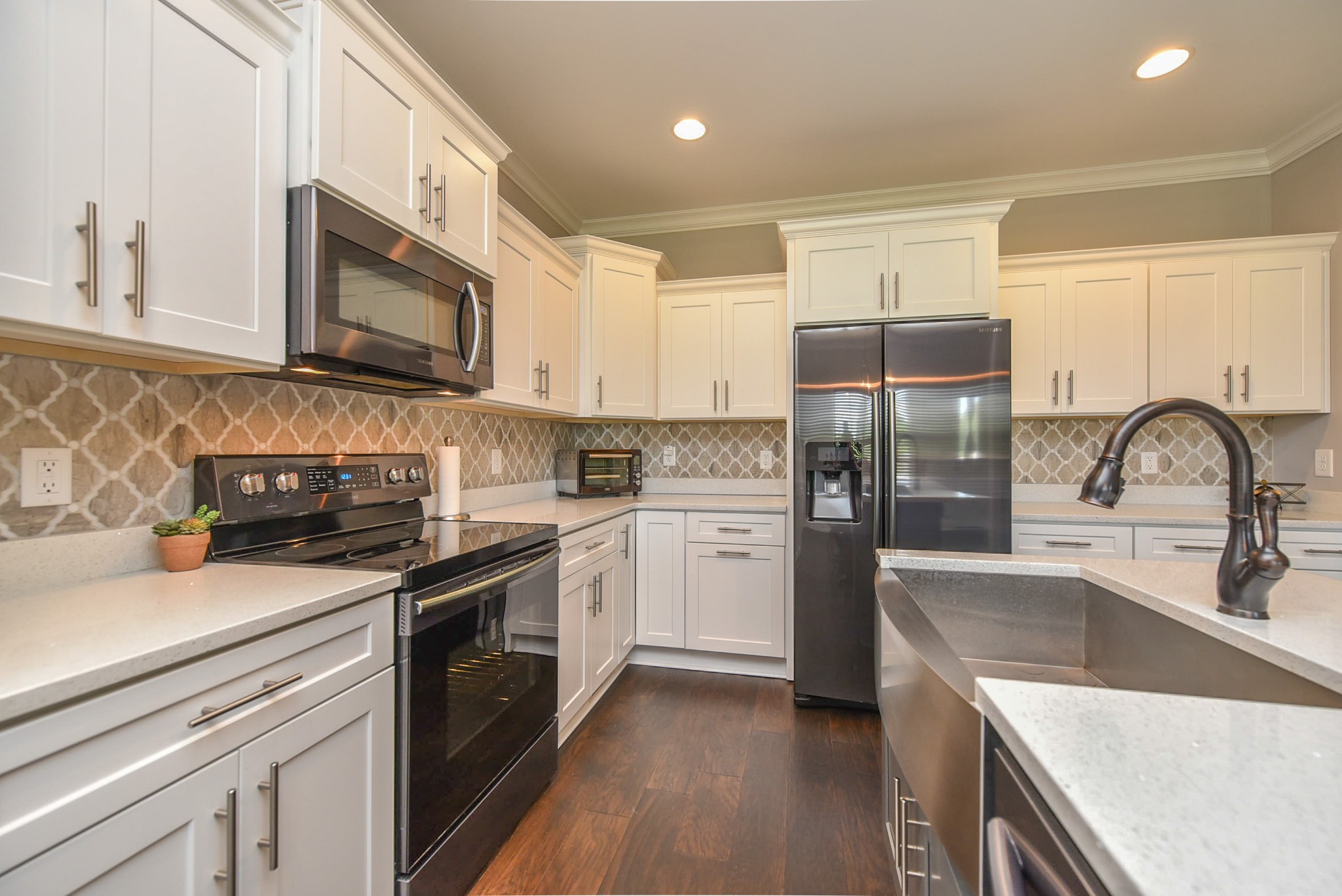 100 Edwards Road Lebanon, TN 37090 - Photo 14 of 36 a kitchen with a sink stove and refrigerator