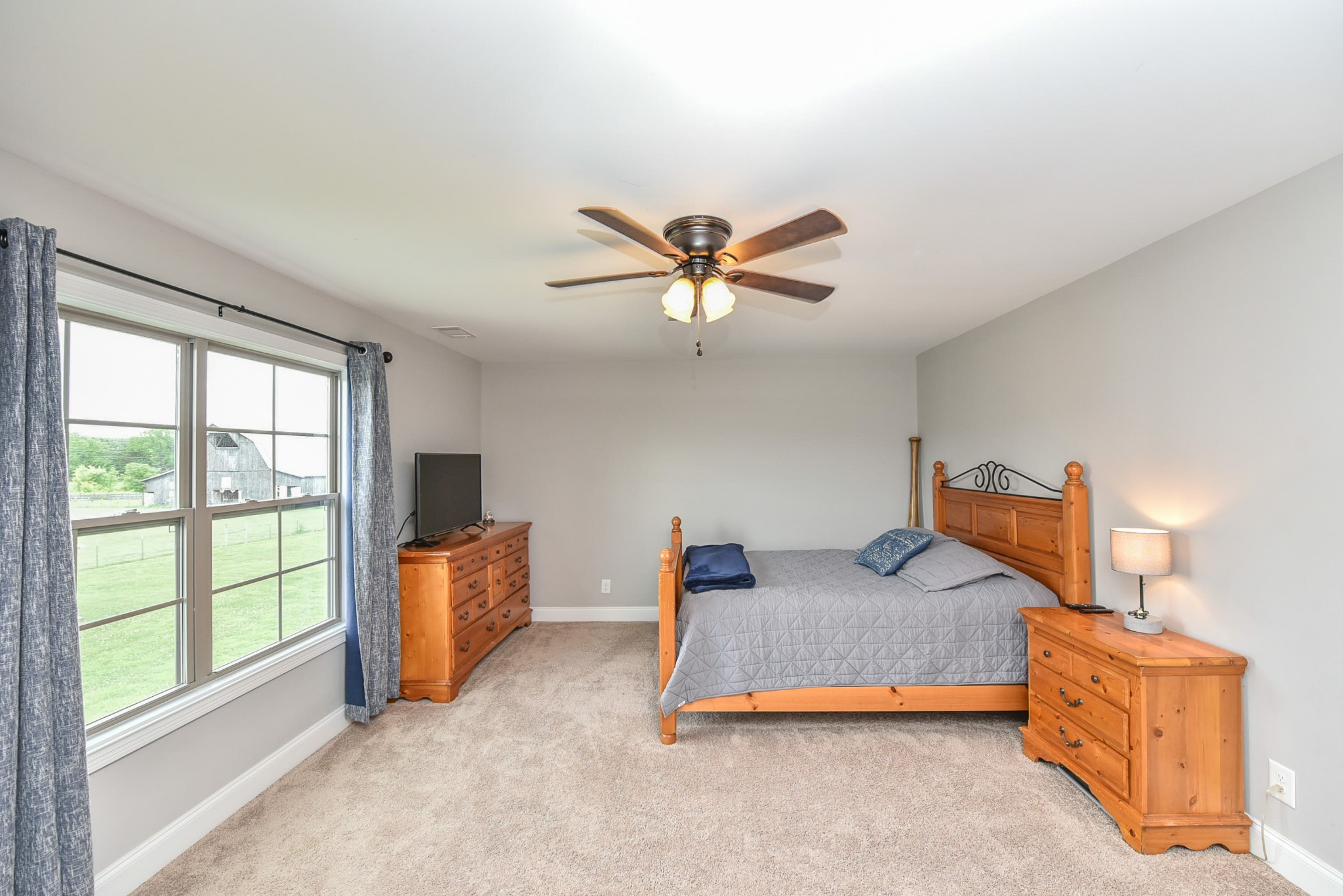 100 Edwards Road Lebanon, TN 37090 - Photo 22 of 36 a bedroom with furniture and a large window