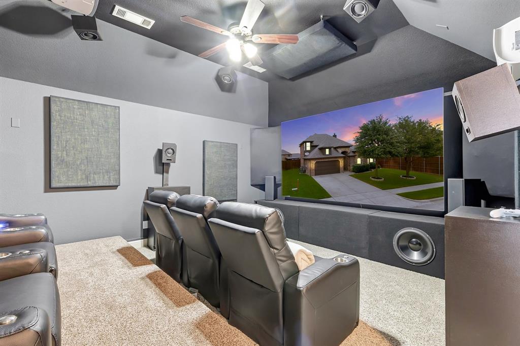 1105 Safrano Street Midlothian, TX 76065 - Photo 6 of 25 a living room with furniture and a flat screen tv