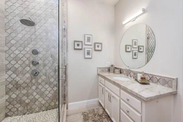 a view of a patio with a table and chairs
