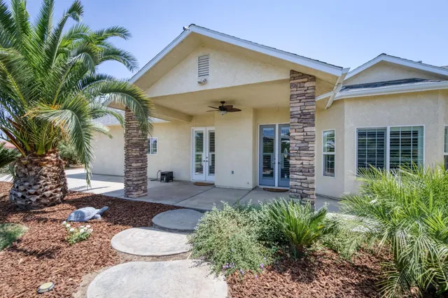 a view of a playground with basketball court