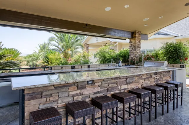 a view of a garage with parked cars