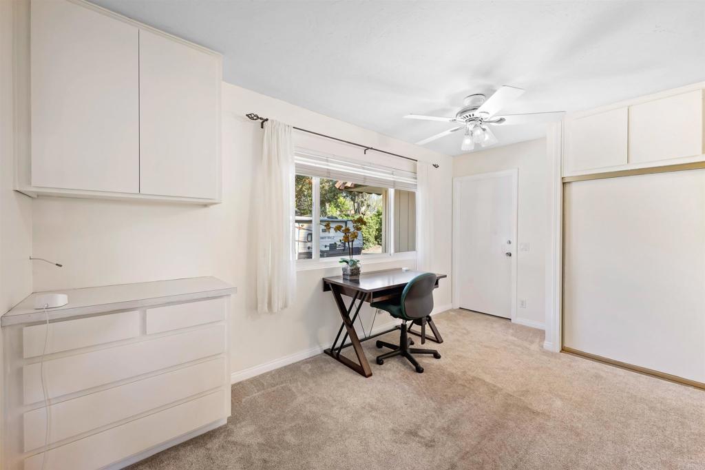 846 Val Sereno Drive Encinitas, CA 92024 - Photo 17 of 43 a view of a workspace with furniture and a window