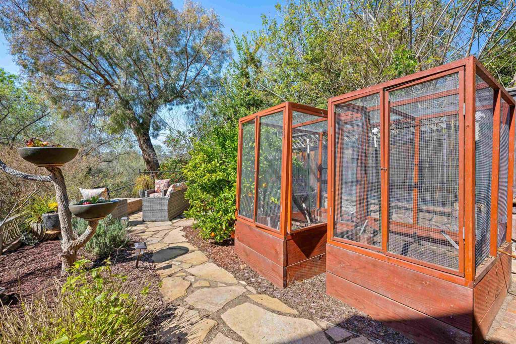 846 Val Sereno Drive Encinitas, CA 92024 - Photo 31 of 43 a view of a backyard with sitting area and garden