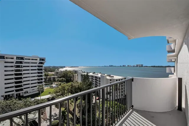 a bedroom with furniture and a flat screen tv