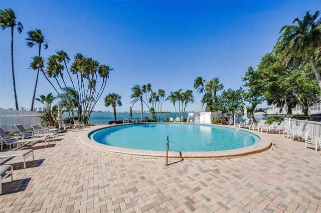 a view of swimming pool with a garden