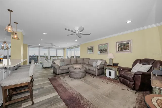 a large kitchen with a table and chairs