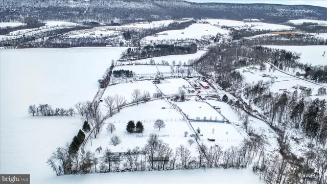 a view of swimming pool with a yard and mountain view