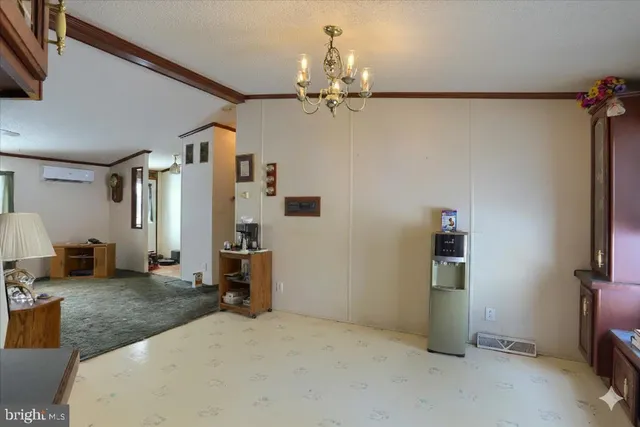 a open kitchen with cabinets and stainless steel appliances