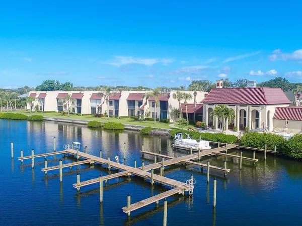 a view of house with a lake view