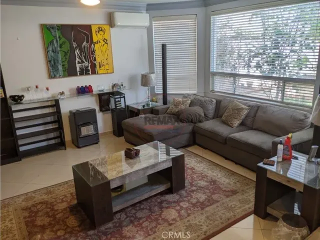 a room with table and chairs