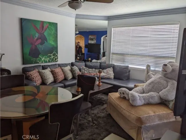 a view of a chairs and table in a patio