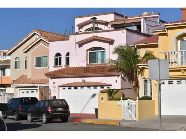 a view of a car in front of a house