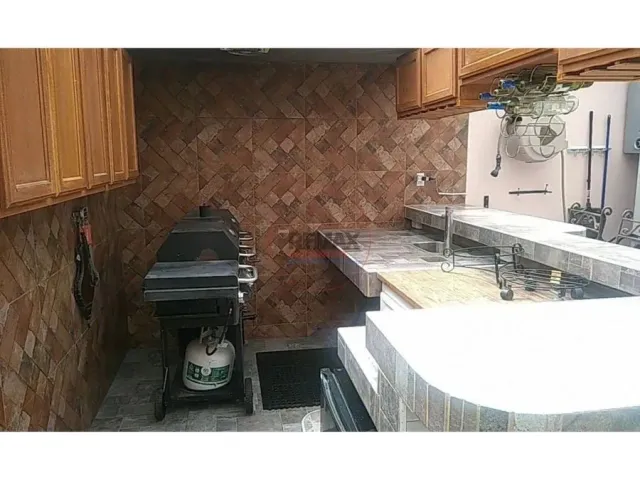 a bathroom with a sink and mirror