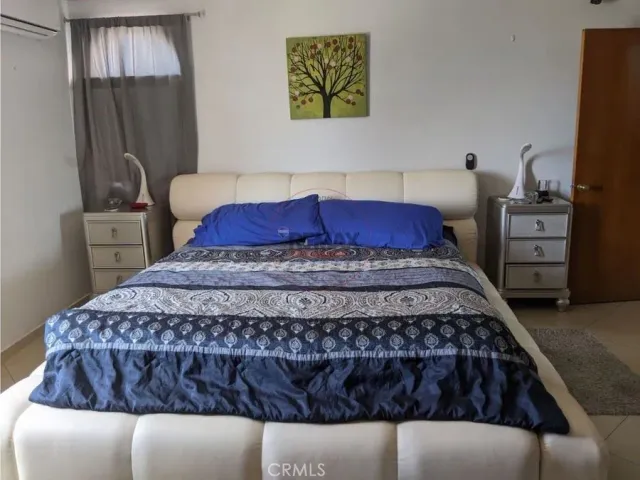 a view of a terrace with furniture and a table