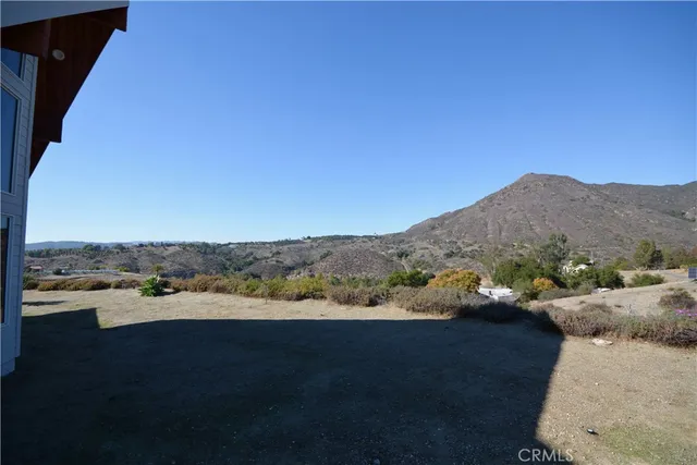 a view of mountain with lake view