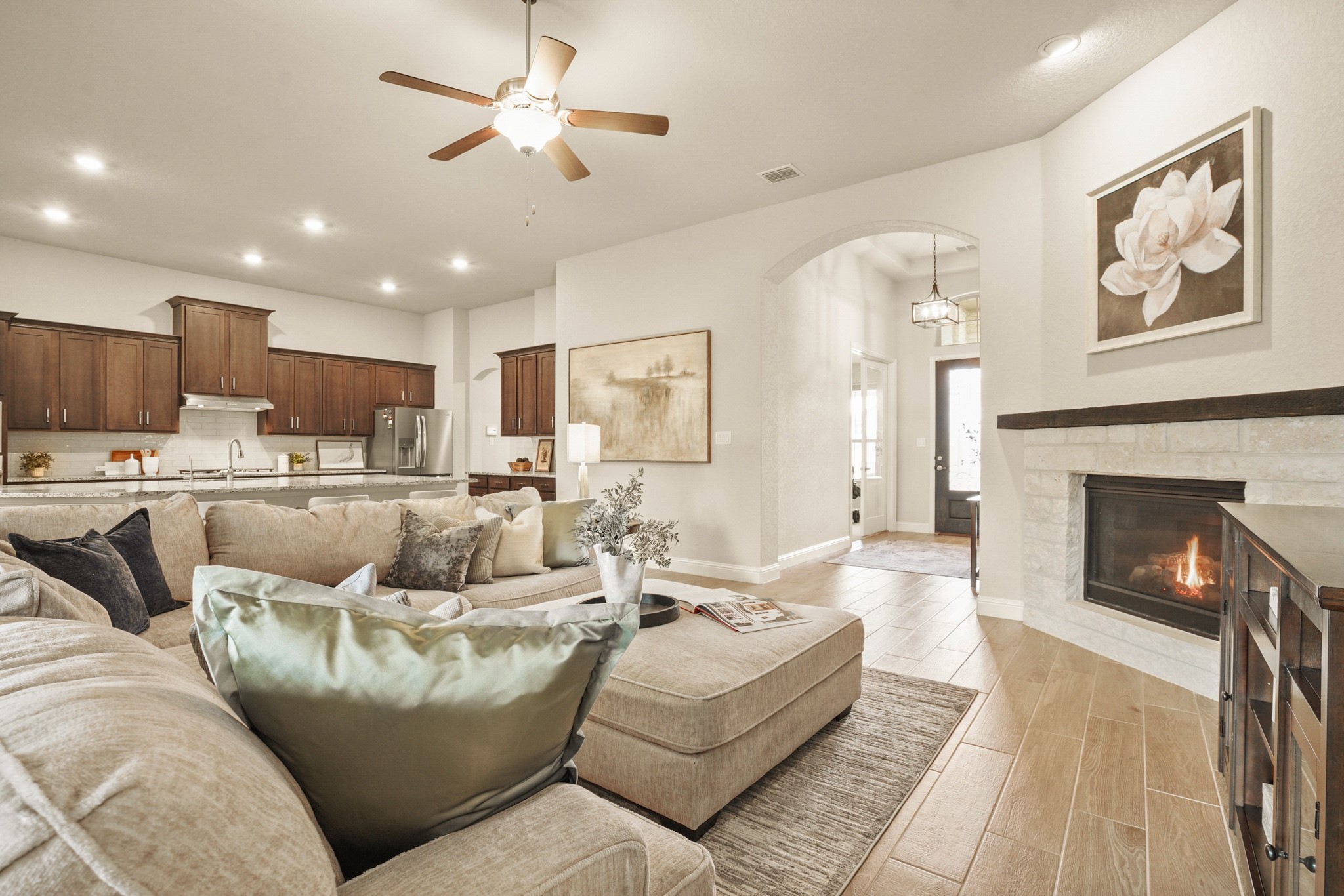 29411 Kearney Ridge Boerne, TX 78015 - Photo 11 of 34 a living room with furniture and a fireplace