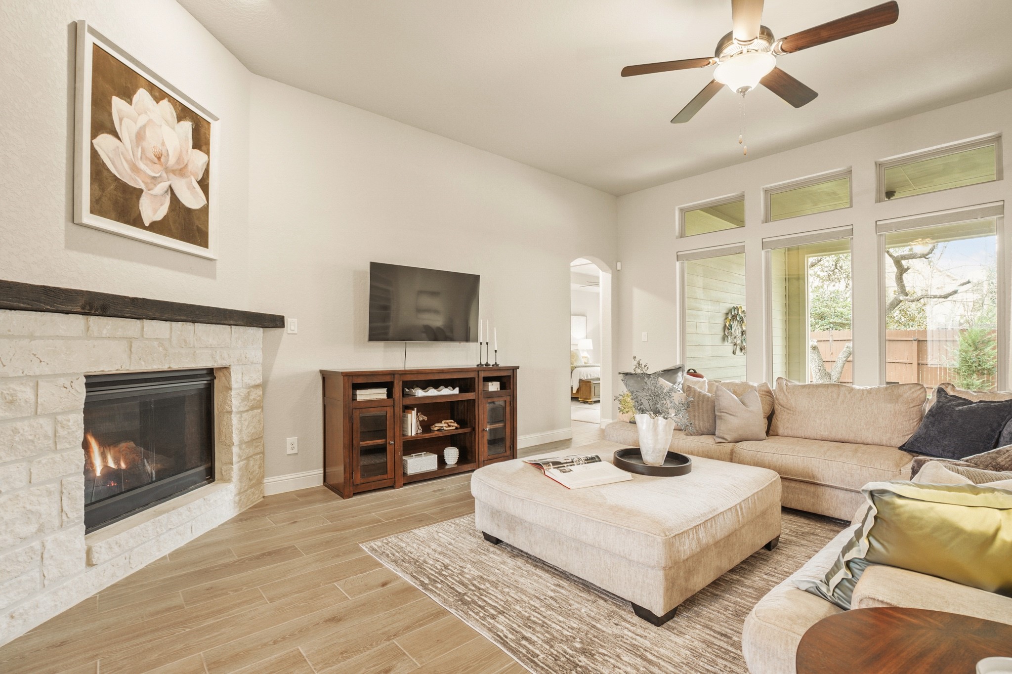 29411 Kearney Ridge Boerne, TX 78015 - Photo 16 of 34 a living room with furniture and a fireplace