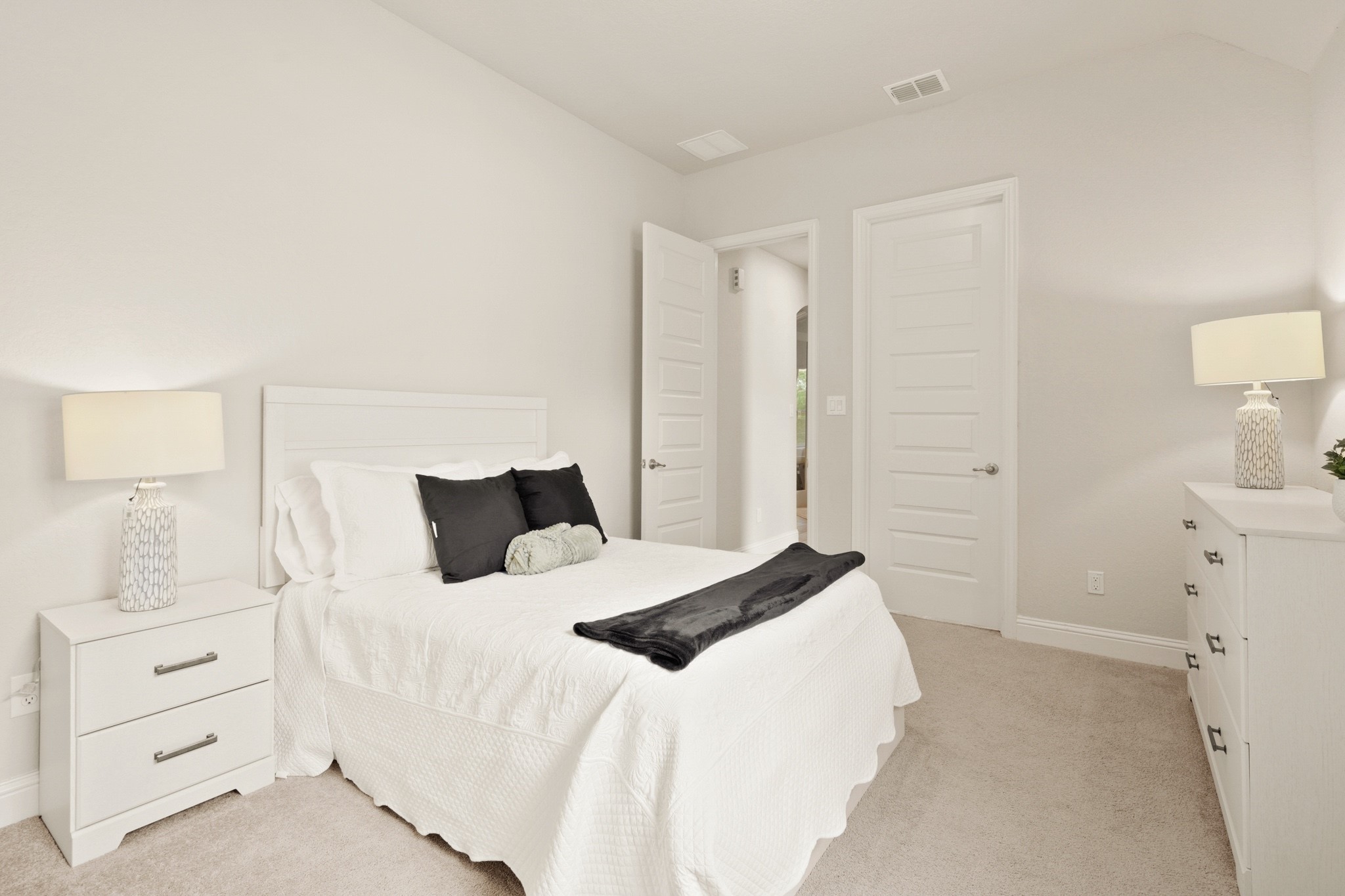 29411 Kearney Ridge Boerne, TX 78015 - Photo 20 of 34 a bedroom with a bed and a cabinets