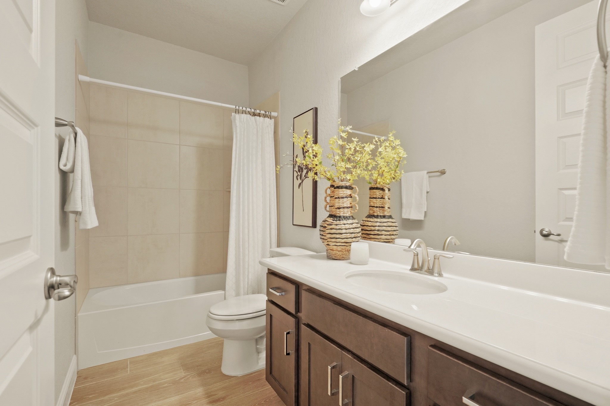 29411 Kearney Ridge Boerne, TX 78015 - Photo 24 of 34 a bathroom with a granite countertop sink a toilet and shower