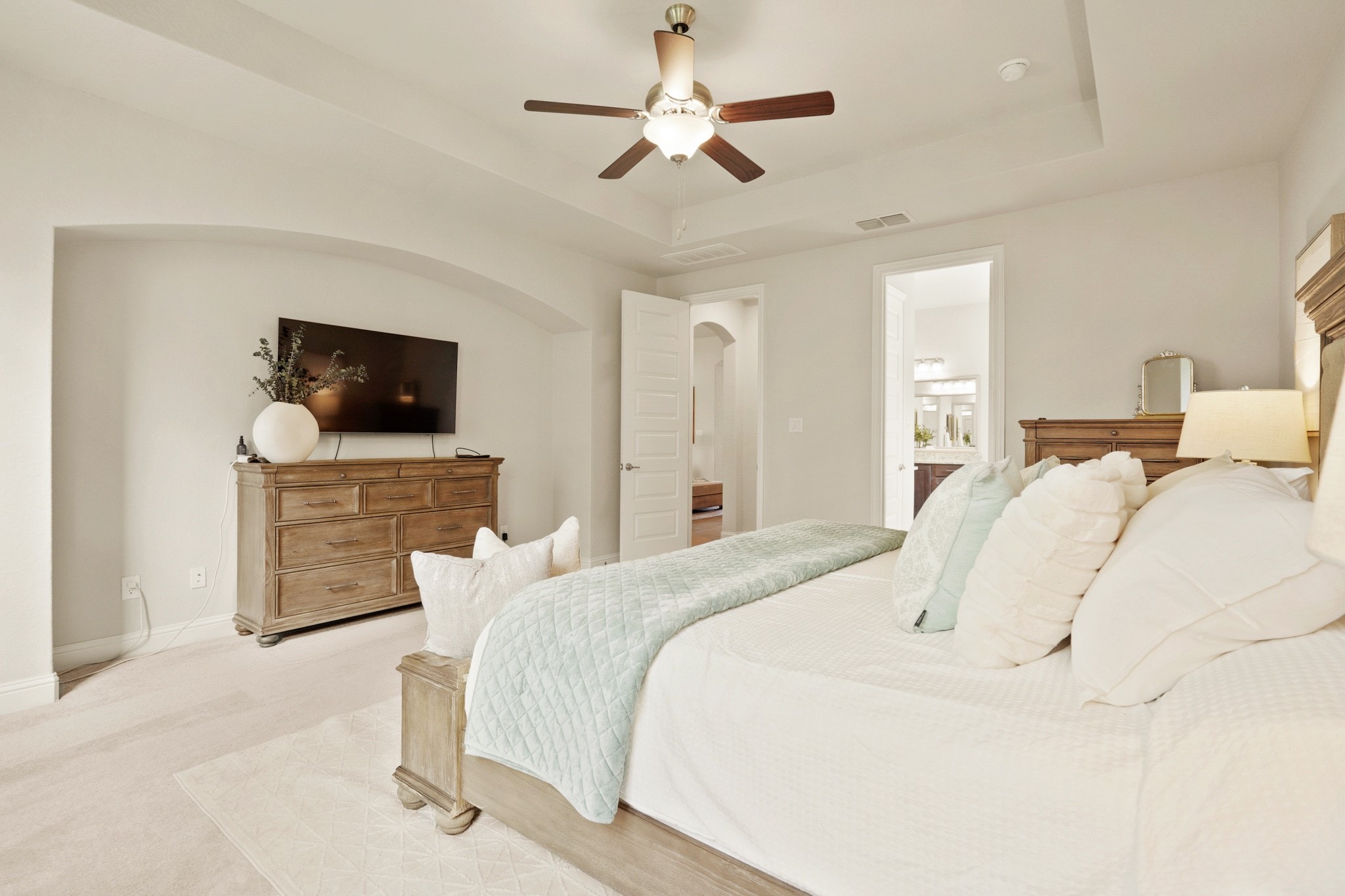 29411 Kearney Ridge Boerne, TX 78015 - Photo 7 of 34 a bedroom with a bed and a flat screen tv