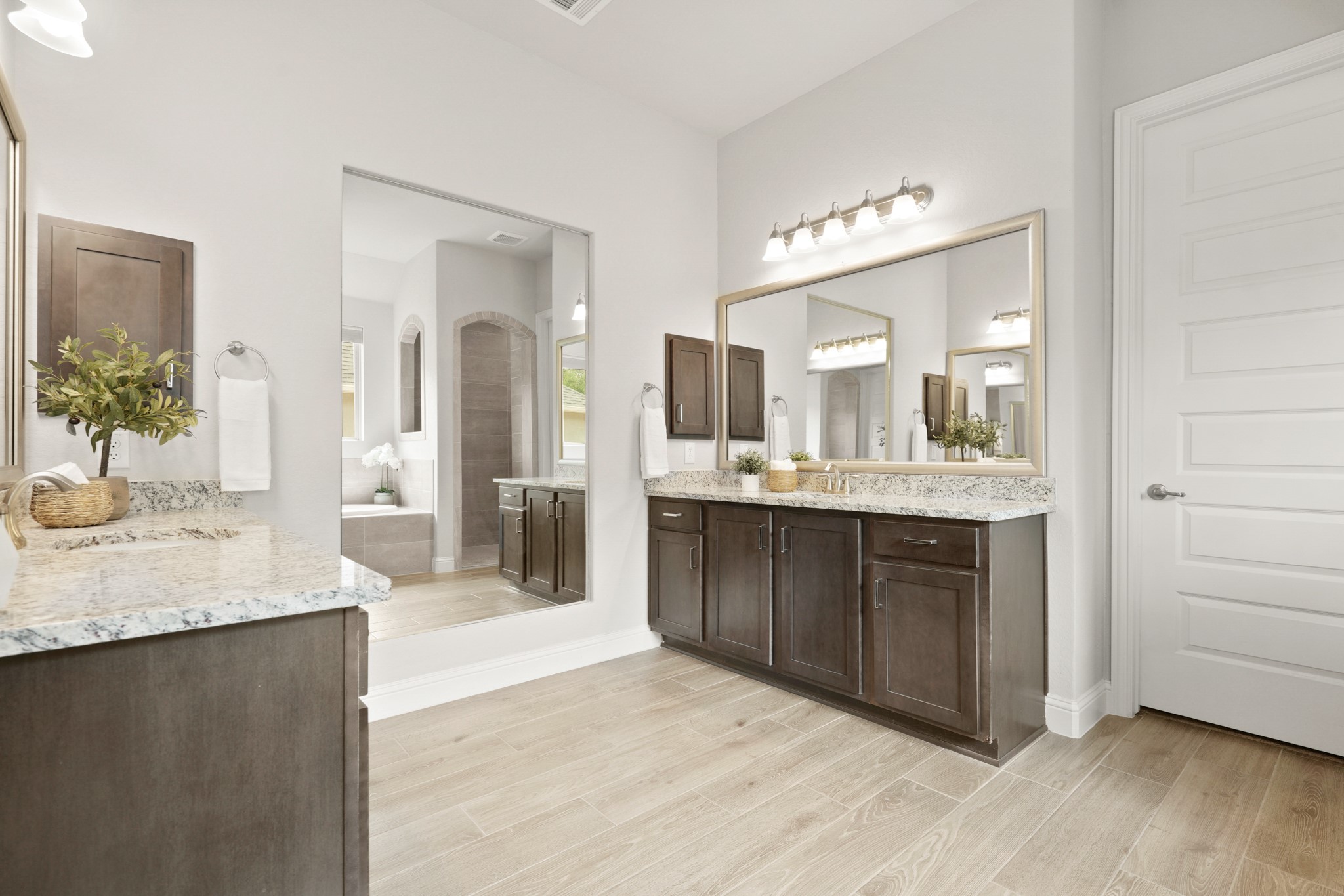 29411 Kearney Ridge Boerne, TX 78015 - Photo 8 of 34 a bathroom with a granite countertop sink mirror and vanity