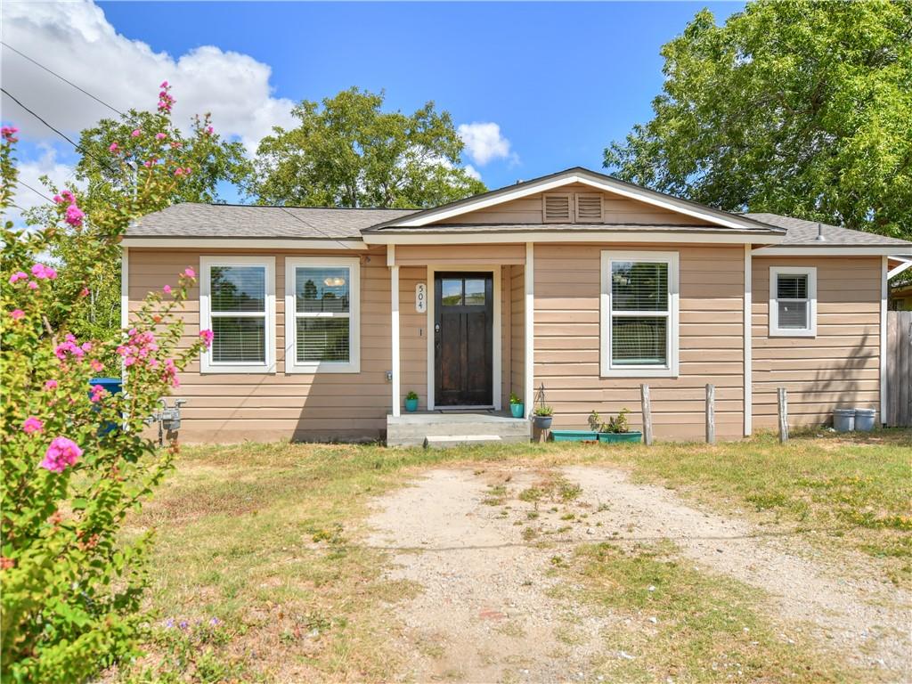 a front view of a house with a porch
