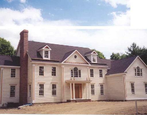 32 Easton Road Westport, CT 06880 - Photo 1 of 1 a front view of a house with a yard