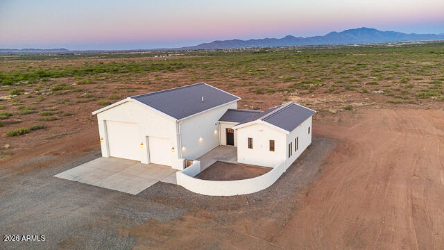 6233 West Airport Road Willcox, AZ 85643 - Photo 49 of 54 a view of a lake with a mountain