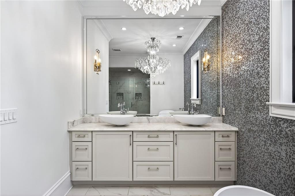 5320 Riverview Road Northwest Atlanta, GA 30339 - Photo 37 of 83 a bathroom with a granite countertop sink a mirror and a