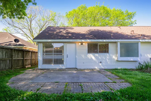 a house view with a garden space