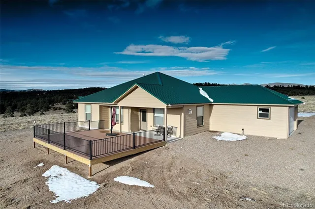 a view of house with yard