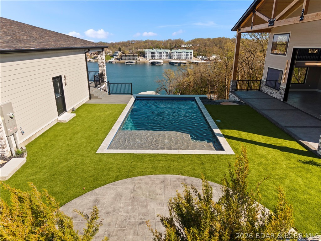 1356 Duckhead Road Lake Ozark, MO 65049 - Photo 5 of 99 Heated, saltwater 16x32 pool with retractable cove