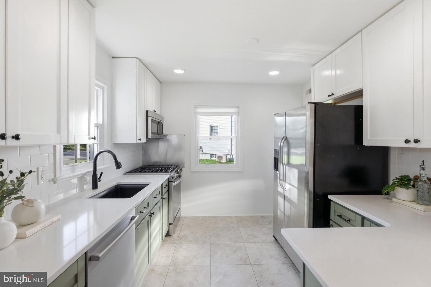 10419 Grandin Road Silver Spring, MD 20902 - Photo 8 of 45 Modern kitchen with sleek finishes.